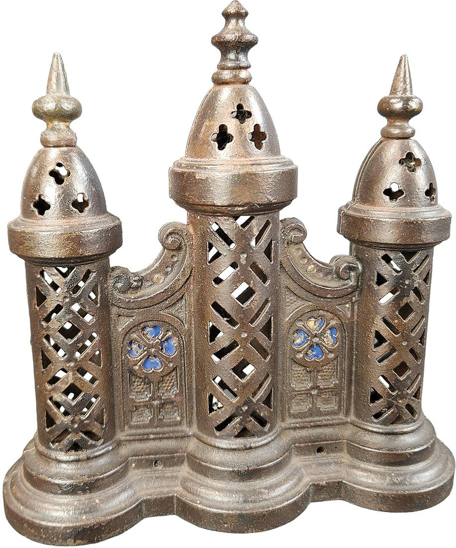 CHURCH TOWERS STILL BANK: 385. CHURCH TOWERS STILL BANK | Eddy & Stephens. Window cut outs in front of paper inserts are cast in place and only the top are open making this an unusual example. | 6.5" h. | Original paper insert