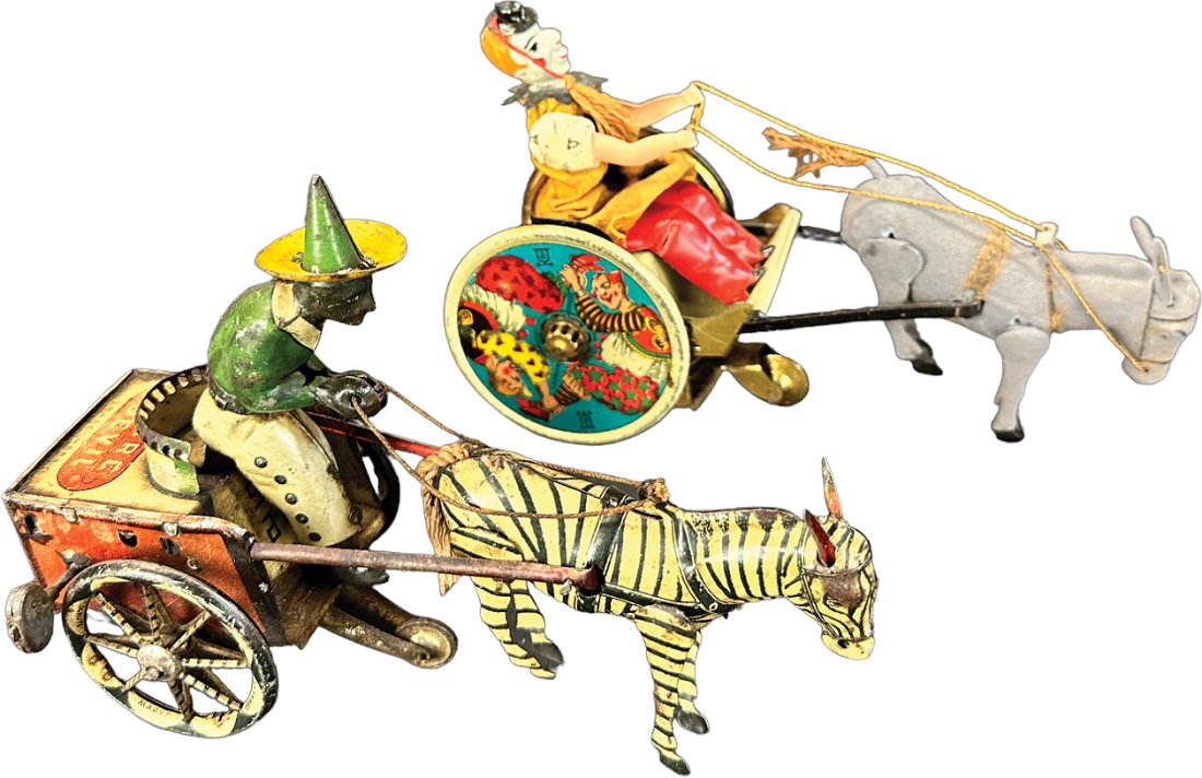 LEHMANN DAREDEVIL W/ BALKY MULE: 24. LEHMANN DAREDEVIL W/ BALKY MULE | Germany. Wind-up causes toy to roll forward | 7" l. | Zebra cart is in (Very Good Condition), clown cart is (Excellent to Pristine Condition) | $150 - $300