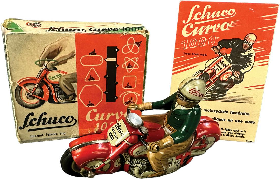 SCHUCO CURVO 1000 MOTORCYCLE: 47. SCHUCO CURVO 1000 MOTORCYCLE | Germany. Wind-up causes toy to move forward | 5.25" l. | Box has tape and one end flap is replaced, (Excellent Condition) | $250 - $500