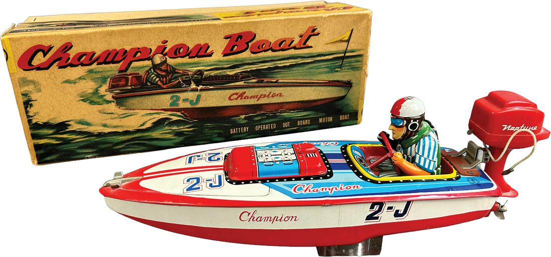BOXED MARUSAN CHAMPION BOAT RACER: 131. BOXED MARUSAN CHAMPION BOAT RACER | Japan. Wind-up | 10/5" l. | Small tears at end flap of box, otherwise (Pristine Condition) | $200 - $400