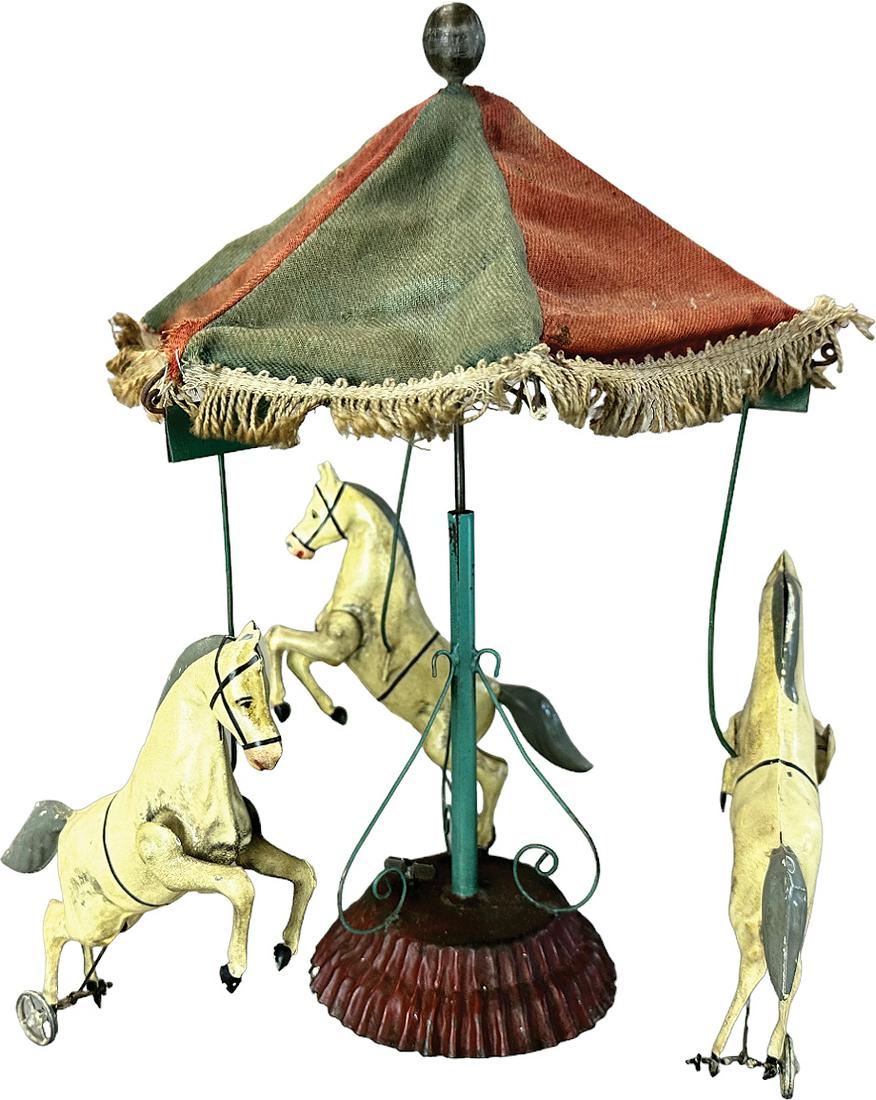 FRENCH THREE PRANCING HORSE CAROUSEL: 166. FRENCH THREE PRANCING HORSE CAROUSEL | France. Nice form. Wind-up causes toy to revolve | 13" h. | Professionally restored. | $300 - $600