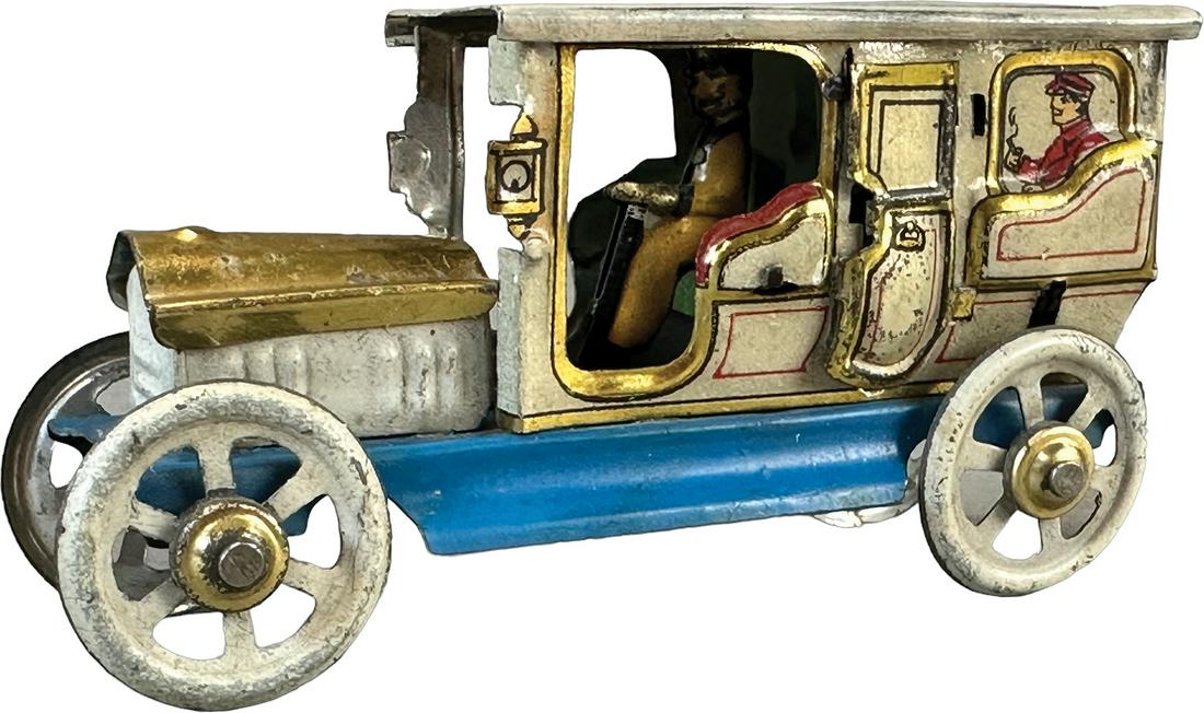 DISTLER LIMOUSINE PENNY TOY: 191. DISTLER LIMOUSINE PENNY TOY | 3.5" l. | $150 - $300 | Roof is replaced, missing one tab at opening door, otherwise lithography is in (Excellent Condition)