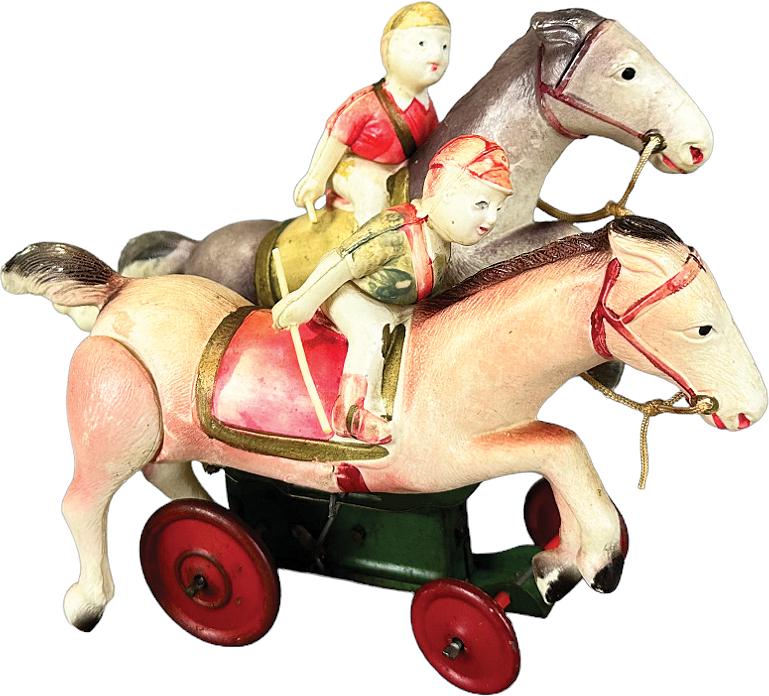 JAPANESE CELLULOID HORSE RACE WIND-UP: 215. JAPANESE CELLULOID HORSE RACE WIND-UP | Japan. Wind-up causes toy to move forward | 6.5" l. | (Excellent Condition) | $150 - $300