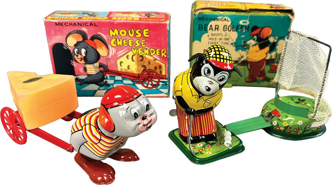 TWO BOXED JAPANESE WIND-UP TOYS: 221. TWO BOXED JAPANESE WIND-UP TOYS | Japan. Wind-up | 8" l. | Golfer box torn in areas, toys (Pristine Condition) | $250 - $500