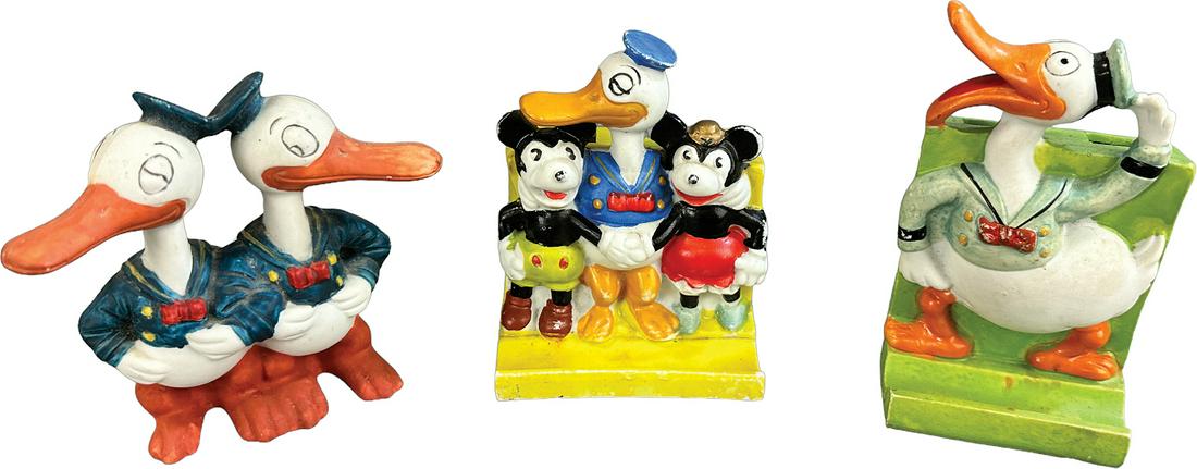 THREE PORCELAIN DONALD DUCK TOOTHBRUSH HOLDERS: 370. THREE PORCELAIN DONALD DUCK TOOTHBRUSH HOLDERS | 4.5" w. | (Pristine Condition) | $200 - $400