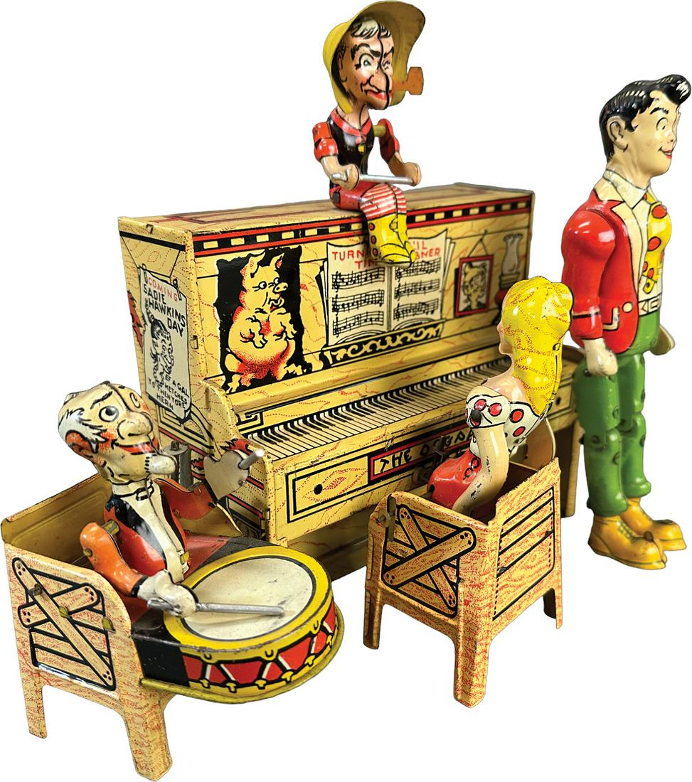 UNIQUE ART LIL ABNER DOGPATCH BAND: 411. UNIQUE ART LIL ABNER DOGPATCH BAND | 8.5" l. | Ma's hat and arms are replaced, lil Abner's red shirt has overpaint, otherwise working in (Excellent Condition) overall | $150 - $300