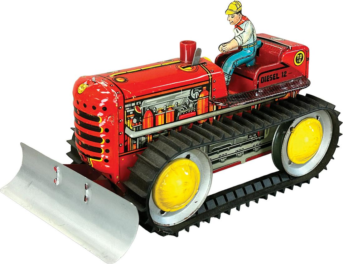 MARX DIESEL 12 TRACTOR W/ PLOW: 416. MARX DIESEL 12 TRACTOR W/ PLOW | USA. Wind-up causes toy to move forward | 8.5" l. | (Excellent Condition) | $150 - $300