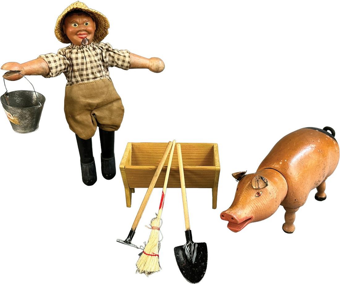 SCHOENHUT FARMER, PIG & ACCESSORIES: 453. SCHOENHUT FARMER, PIG & ACCESSORIES | USA | 8" h. | (Excellent Condition) | $250 - $500
