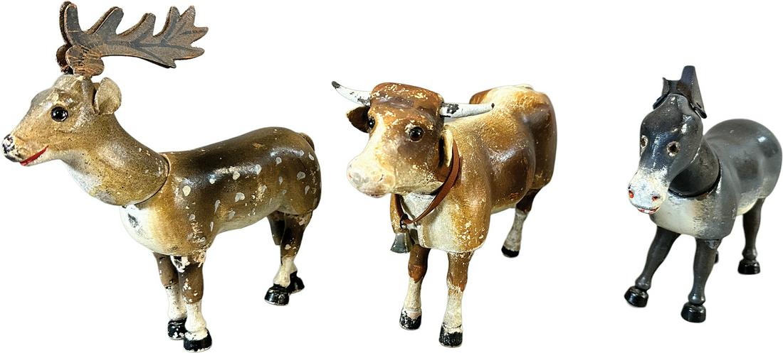 SCHOENHUT GLASS-EYED DEER W/ DONKEY & COW: 476. SCHOENHUT GLASS-EYED DEER W/ DONKEY & COW | USA | 8.5' l. | Cow has one replaced horn and some touchups, donkey is original but has been varnished, (Very Good to Excellent Condition) | $500 - $1,