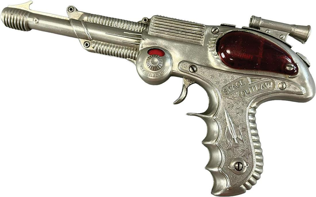 SPACE OUTLAW SPARKLING CAP GUN: 491. SPACE OUTLAW SPARKLING CAP GUN | 10" l. | (Excellent Condition) | $150 - $300