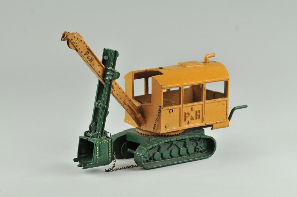 P&H STEAM SHOVEL: Vindex, great casting effects, orange painted housing, green shovel, embossed 'P&H', on sides, green traction wheels, gold trim, a truly unique find. 8 /12 "l. x 6" h. (Exc. Cond.) 11 1/2" x 8 1/2" h.