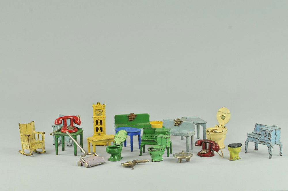 ASSORTED MINIATURE CAST IRON HOUSEHOLD ITEMS: Kilgore, large lot includes indoor cast iron miniature household items, painted in varied colors, makes nice display set. Approx. 2"- 4" l. Sink has broken leg. Some paint wear. (Good - Exc. Cond.) Ap