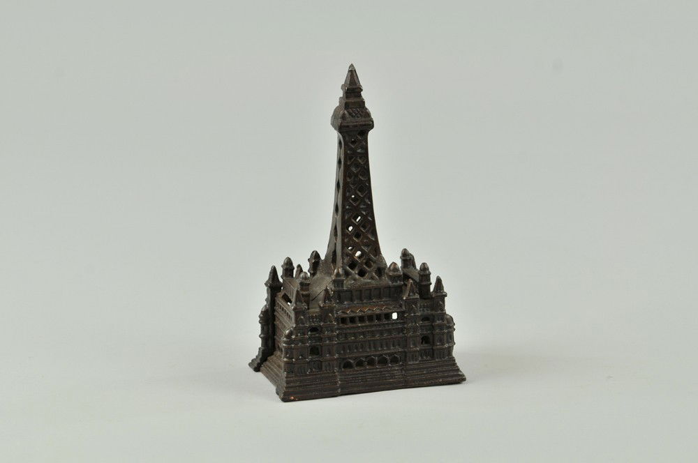 BLACKPOOL TOWER STILL BANK: Chamberlain & Hill, England, cast iron, japanned overall, depicts tower on building. 7 3/8" x 4 3/8" (VG Cond) 7 3/8" x 4 3/8"