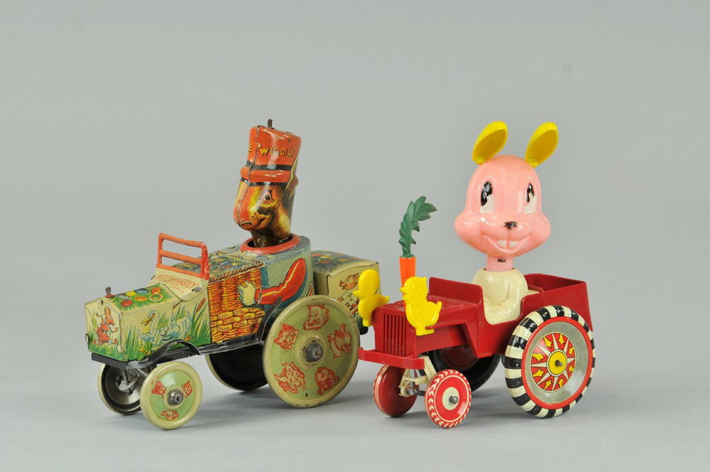 UNCLE WIGGLY AND PETER RABBIT CAR: Louis Marx, lithographed tin and plastic, amusing and very colorful toys, depicts Uncle Wiggly and Peter at wheel, extensive graphics overall, both key wind driven. 6" - 7 1/4" l. Minor scratches over