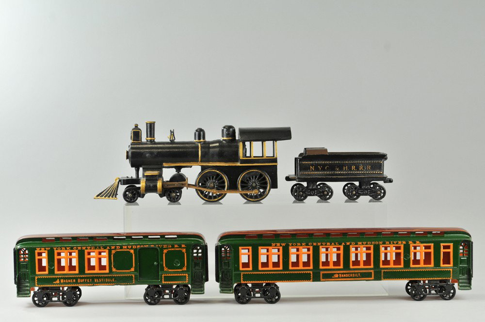 KENTON "VANDERBILT" FLOOR TRAIN: One of the rarest and largest of the toy company's line, elaborate cast iron set features the "Wagner Buffet Vestibule," and the "Vanderbilt" coach together with the large 4-4-0 black and "NYC & HRRR"
