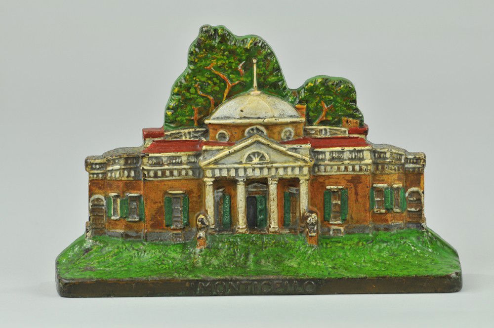 "MONTICELLO" HOUSE DOORSTOP: BOOK EXAMPLE, "Albany Foundry," home of Thomas Jefferson, the 3rd president of the United States. Marked Monticello on front of base, beautiful coloring and detailed casting. 5 1/2" x 8 3/4". (Pristin