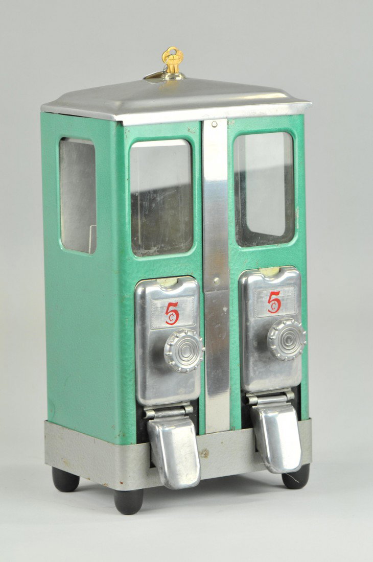 FIVE CENT COUNTERTOP DOUBLE: Vendor Nut vending machine, double sided vending machine, glass front, metal case, includes keys. 12 1/2" h. (Exc. Cond) 12 1/2" h.