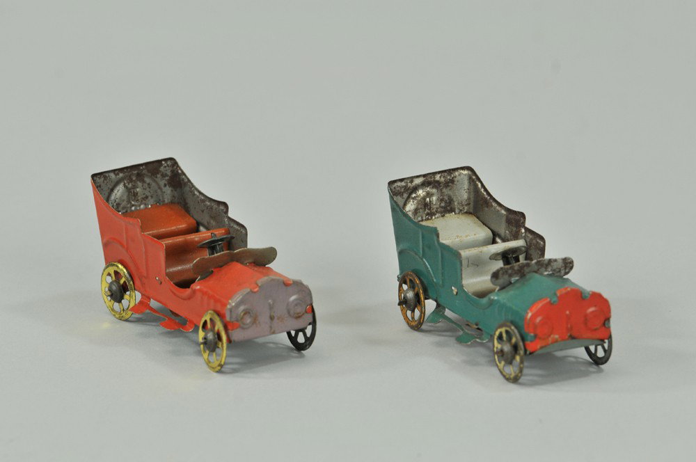 LOT OF TWO FISCHER LIMOUSINE PENNY TOYS: Germany, both lithographed in tin, one in blue, one in brown, features one seated driver, and one with graphics of driver at windows. 4" to 4 1/2" l. Some wear to blue example, overall (Exc. Cond) 4" 