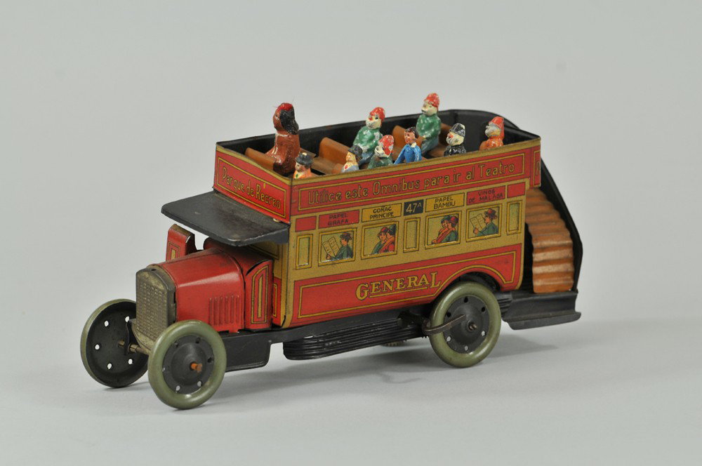 PAYA DOUBLE DECKER BUS: Spain, very desirable Double Decker bus with destinations written in Spanish on sides, lithographed tin, passenger graphics at windows, upper deck bench seating, clockwork. 8 3/4" l. Some wear at roof