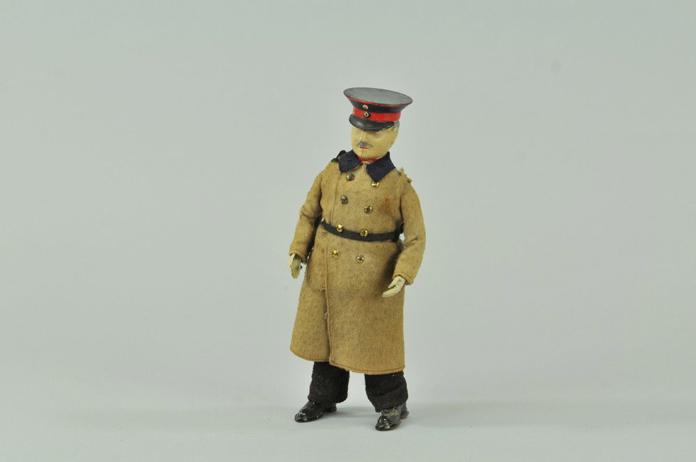LEHMANN CAPTAIN OF KOPEVNIK: Germany, scarce example, the company redressed its sailor toy and re-outfitted this toy to resemble the scam artist cobbler who stole treasury money in similar suit in 1906, clockwork mechanism. 7 1/2