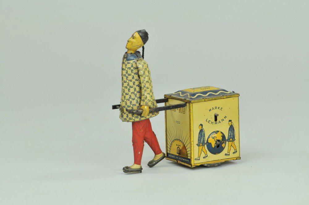 LEHMANN NU-NU: Germany, lithographed tin, colorful depiction of Chinaman pulling chest of tea, clockwork mechanism concealed within, wheels under chest allow easy motion. 5" l. (Exc. Cond) 5" l.