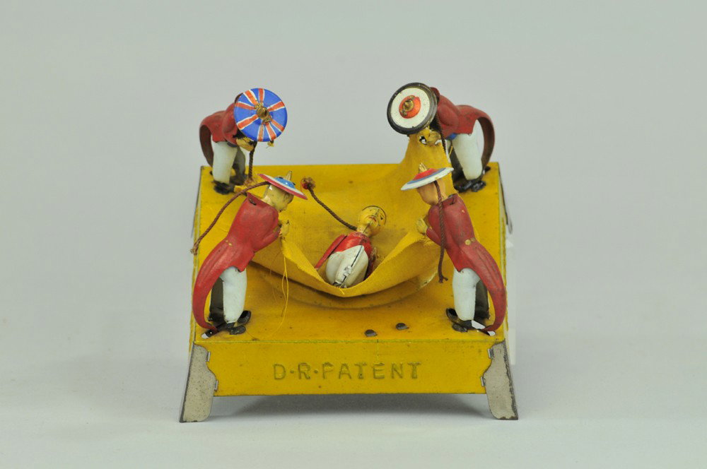 LEHMANN BOXER REBELLION TOY: Germany, rare and desirable example, inspired by the Boxer secret society during the Chinese rebellion of the 1900's, this unique toy depicts Chinese figures ready to "Toss the Chinese" from canopy as