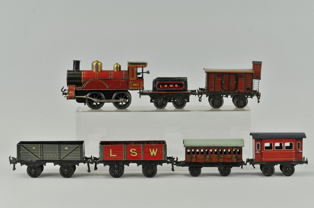 BING "I" GAUGE FREIGHT SET: Germany, includes clockwork powered 0-4-0 engine marked "2631" with L.N.W.R. tender in black, together with two coal cars and caboose in lithographed tin, also includes two Bing cars not from set, one