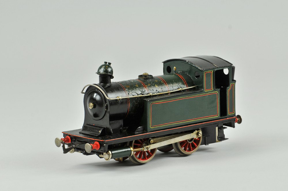 BING GAUGE "1" STEAM LOCOMOTIVE: 0-4-0 green loco in tank style body, full appointments. 9 1/4" l. Heat damage to boiler paint, otherwise (VG Cond) 9 1/4" l.