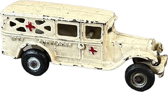ARCADE CITY AMBULANCE: 29. ARCADE CITY AMBULANCE | Provenance: Donald Kaufman Collection. | 6" l. | One added wheel, paint in (Excellent Condition) | $200 - $400