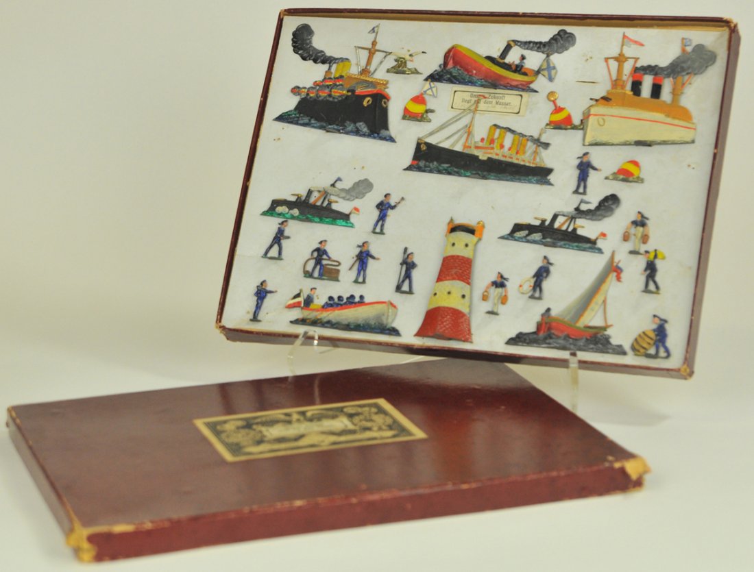 SPENKUCH BOAT AND SAILOR SET: Germany, early 1900's, flat figures with lighthouse and varied ships and books, very carefully painted, original box, no stringing. Box 11 x 14 1/2 ".