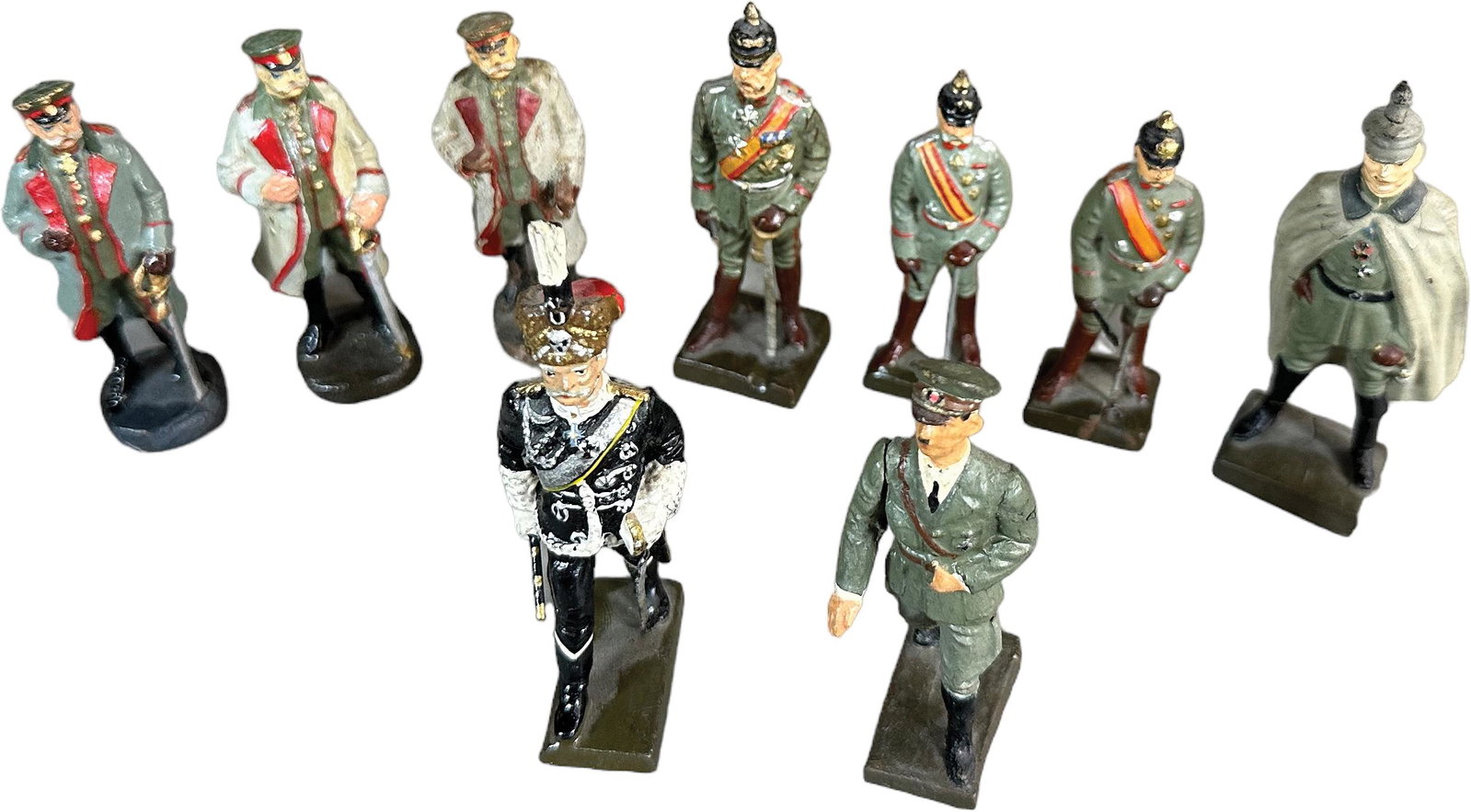 GERMAN COMPOSITION HISTORIC FIGURES: 126. GERMAN COMPOSITION HISTORIC FIGURES | 9 figure lot includes Lineol figures of Ludendorff, Mackensen, Hindenburg and an unusual figure of Hitler with moveable arm. Also 6 smaller figures of Hinden