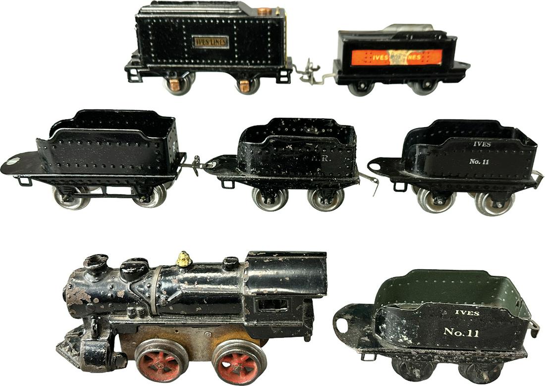 IVES LOCOMOTIVE & SPARE TENDERS: 230. IVES LOCOMOTIVE & SPARE TENDERS | USA. 0 gauge, wind-up. | Loco 6.5" l. | No.17 tender and transition tender are restored, otherwise in (Very Good to Excellent Condition) | $200 - $400