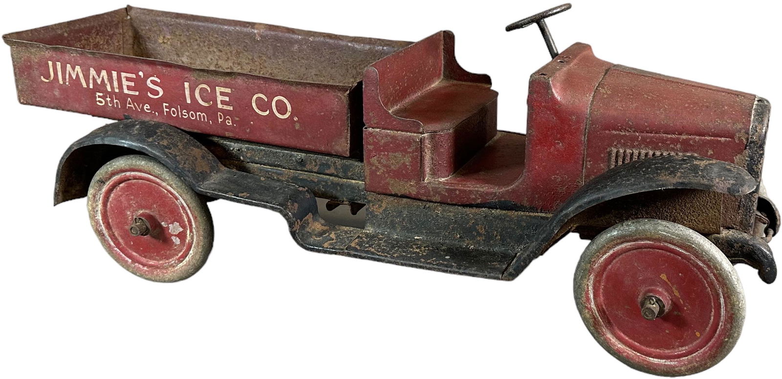 BUDDY L JIMMIES ICE DUMP: 343. BUDDY L JIMMIES ICE DUMP | 25" l. | Heavily oxidized throughout from years of outdoor weather, old stenciling added to sides of bed, (Good to Very Good Condition) | $200 - $400