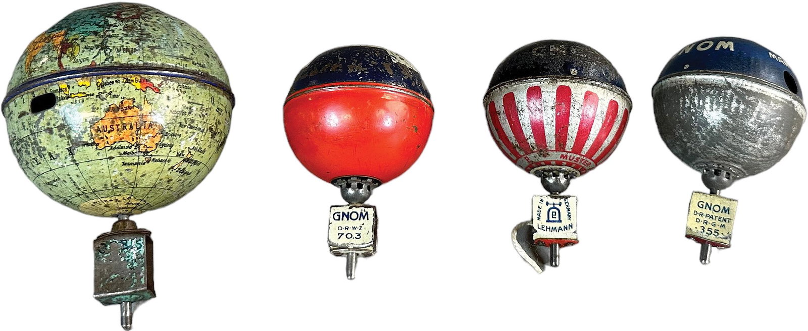 FOUR LEHMANN SPINNING TOPS: 1183. FOUR LEHMANN SPINNING TOPS | Germany. | 3" diameter | (Very Good Condition) | $150 - $300
