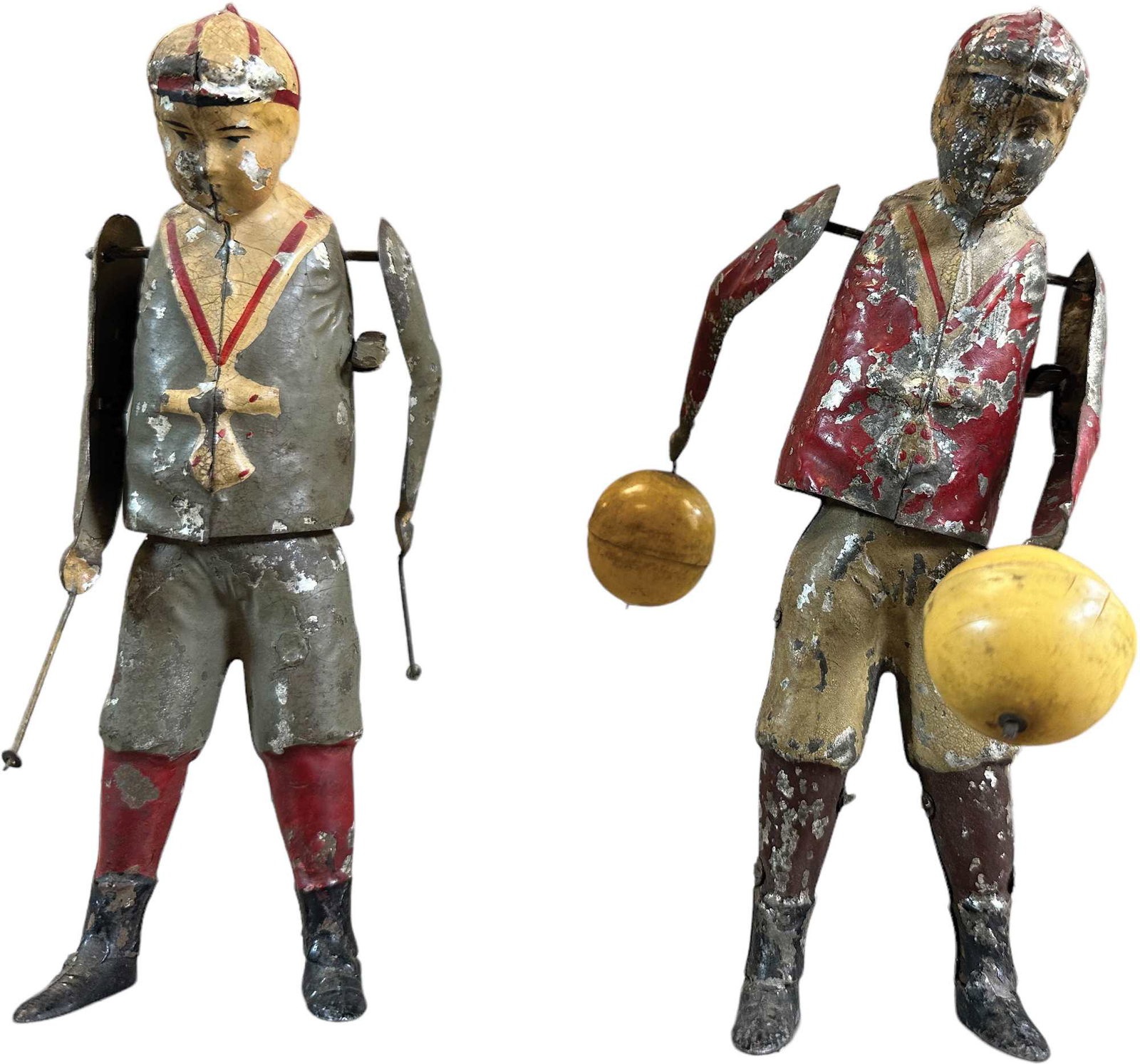 TWO GERMAN TIN BOY TWIRLING BALL TOYS (1 of 5)