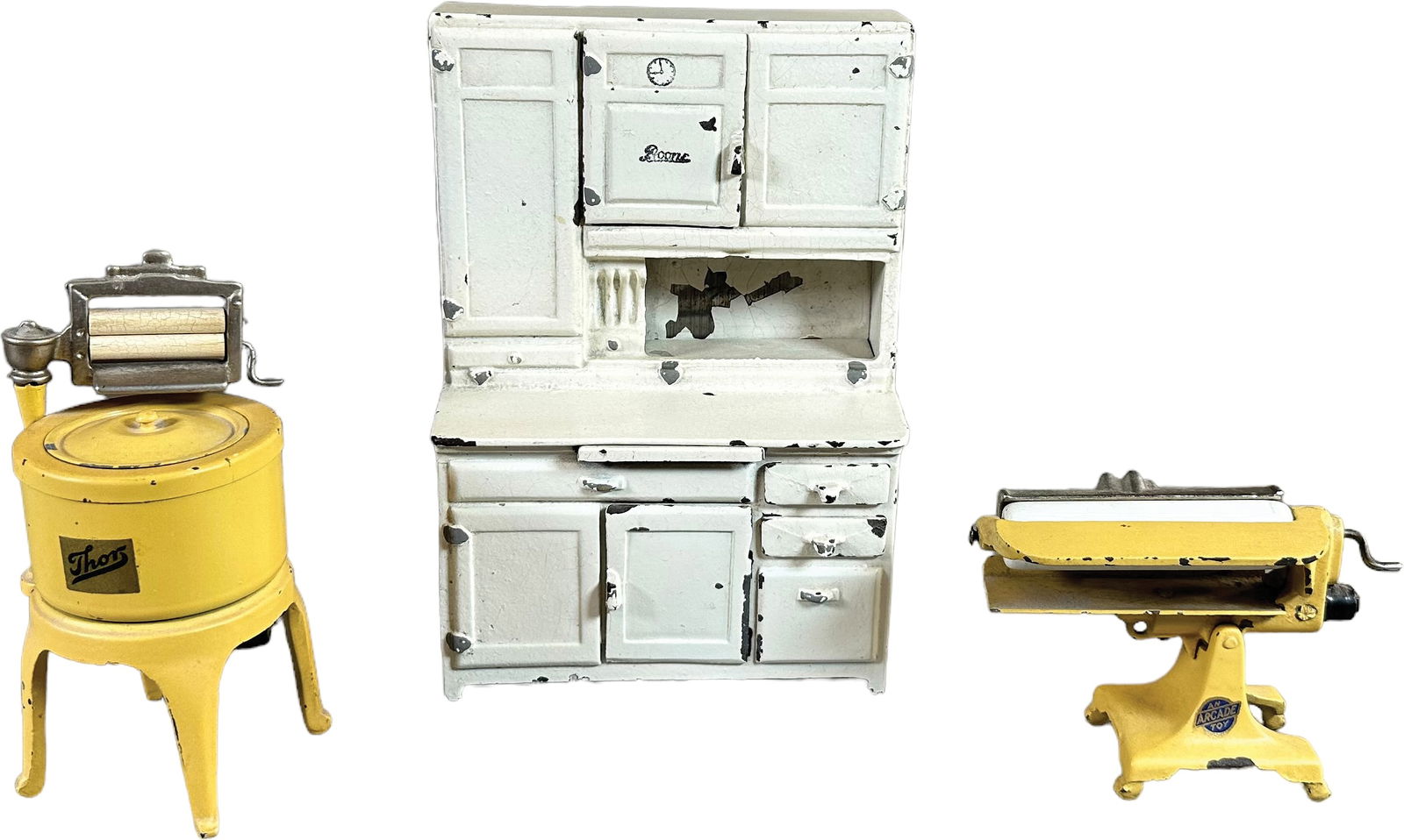 THREE CAST IRON HOUSEHOLD APPLIANCE TOYS (1 of 3)