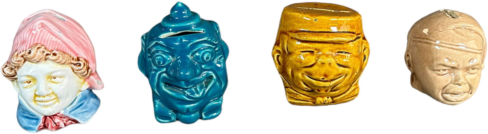 FOUR CERAMIC BUST STILL BANKS (1 of 4)