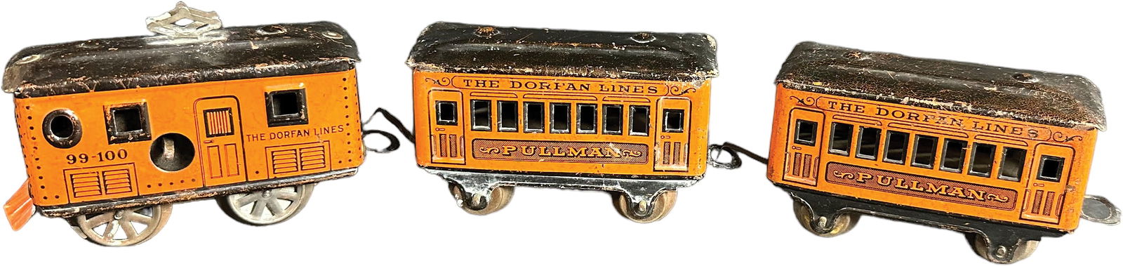 DORFAN 99-100 ELECTRIC PASSENGER SET: 504. DORFAN 99-100 ELECTRIC PASSENGER SET | O gauge, electric, lithographed. | 5" l. | (Very Good to Excellent Condition) | $300 - $500