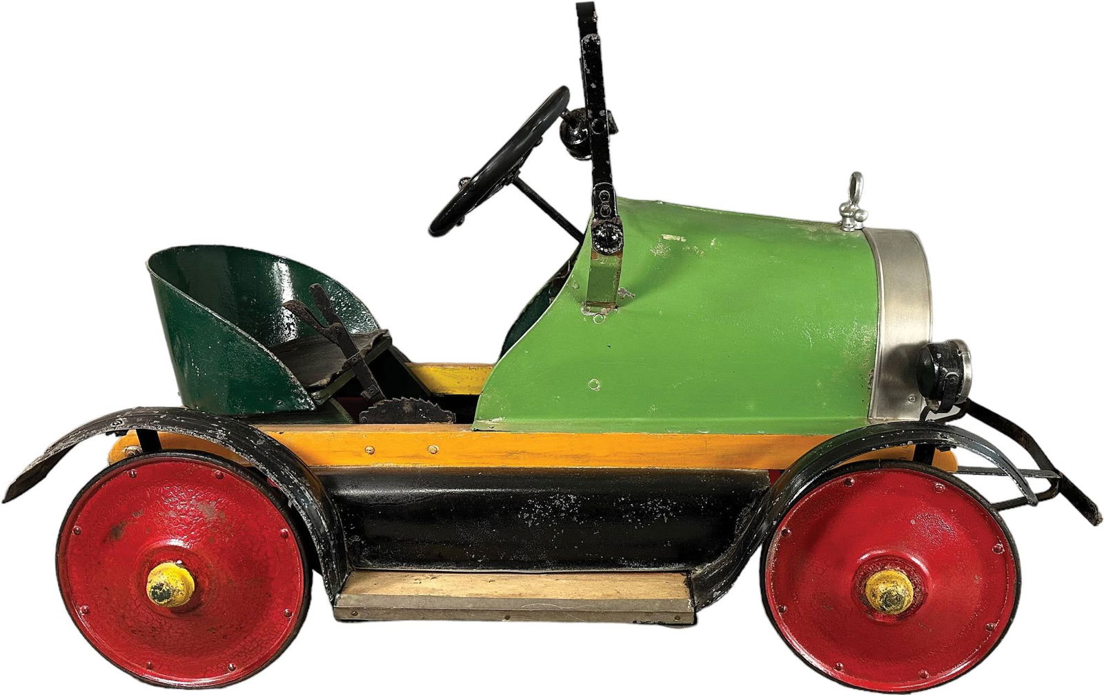 AMERICAN NATIONAL LIBERTY PEDAL CAR: 1405. AMERICAN NATIONAL LIBERTY PEDAL CAR | Deluxe car with oil can inside body, headlights and windscreen spotlight, authentic example has wear and patina as if left outdoors through the weather. | 4