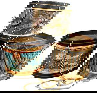 LOT OF THREE TOY DRUMS: 439. LOT OF THREE TOY DRUMS | One with Indians and one patriotic. | 6-7" h. | (Very Good to Excellent Condition) | $150 - $300