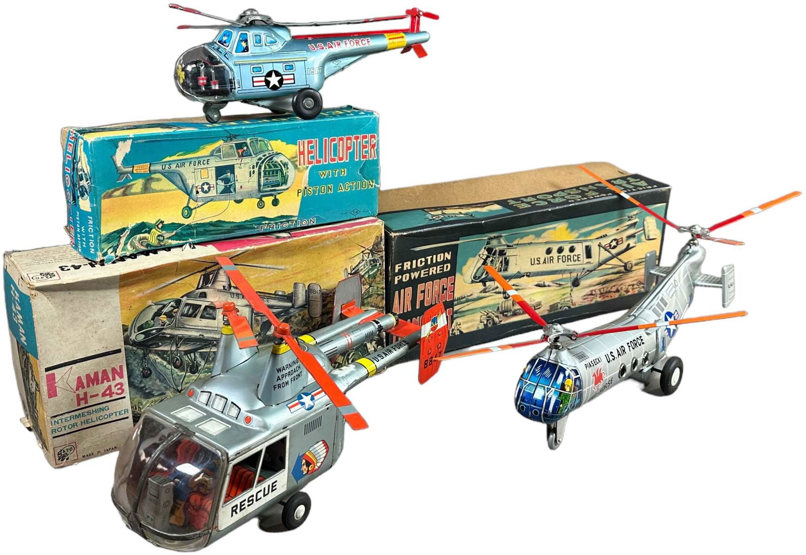 THREE BOXED JAPANESE FRICTION HELICOPTERS (1 of 3)