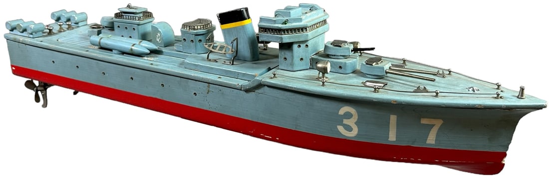 PREWAR JAPANESE TMY WOODEN GUNSHIP: 105. PREWAR JAPANESE TMY WOODEN GUNSHIP | 26" l. | A few small minor deck appointments are missing, paint is original in (Excellent Condition) | $200 - $400