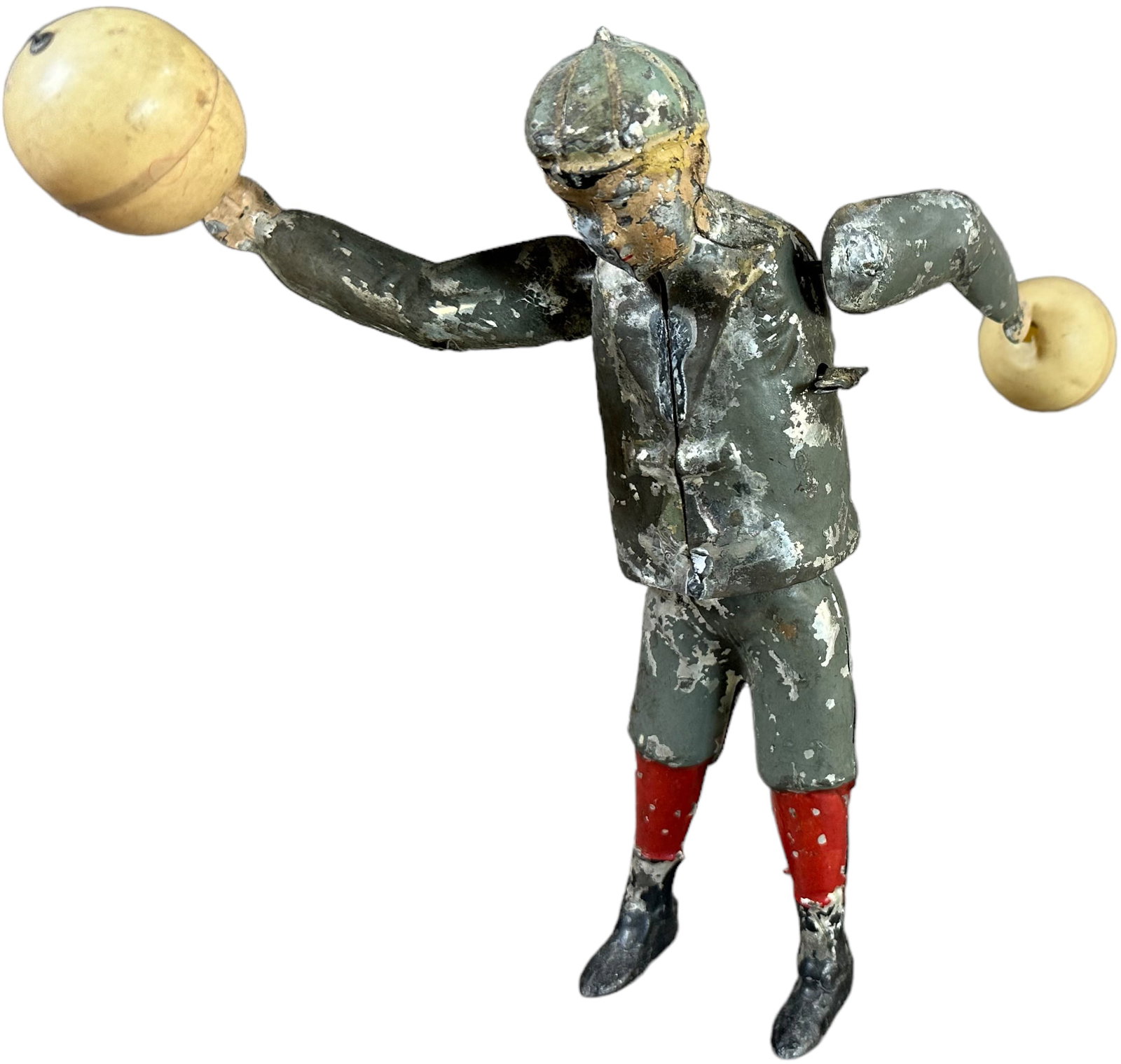 ISSMAYER BOY SPINNING BALLS: 166. ISSMAYER BOY SPINNING BALLS | Germany, wind-up. | 10? h. | Working, worn paint in (Very Good Condition) | $250 - $500