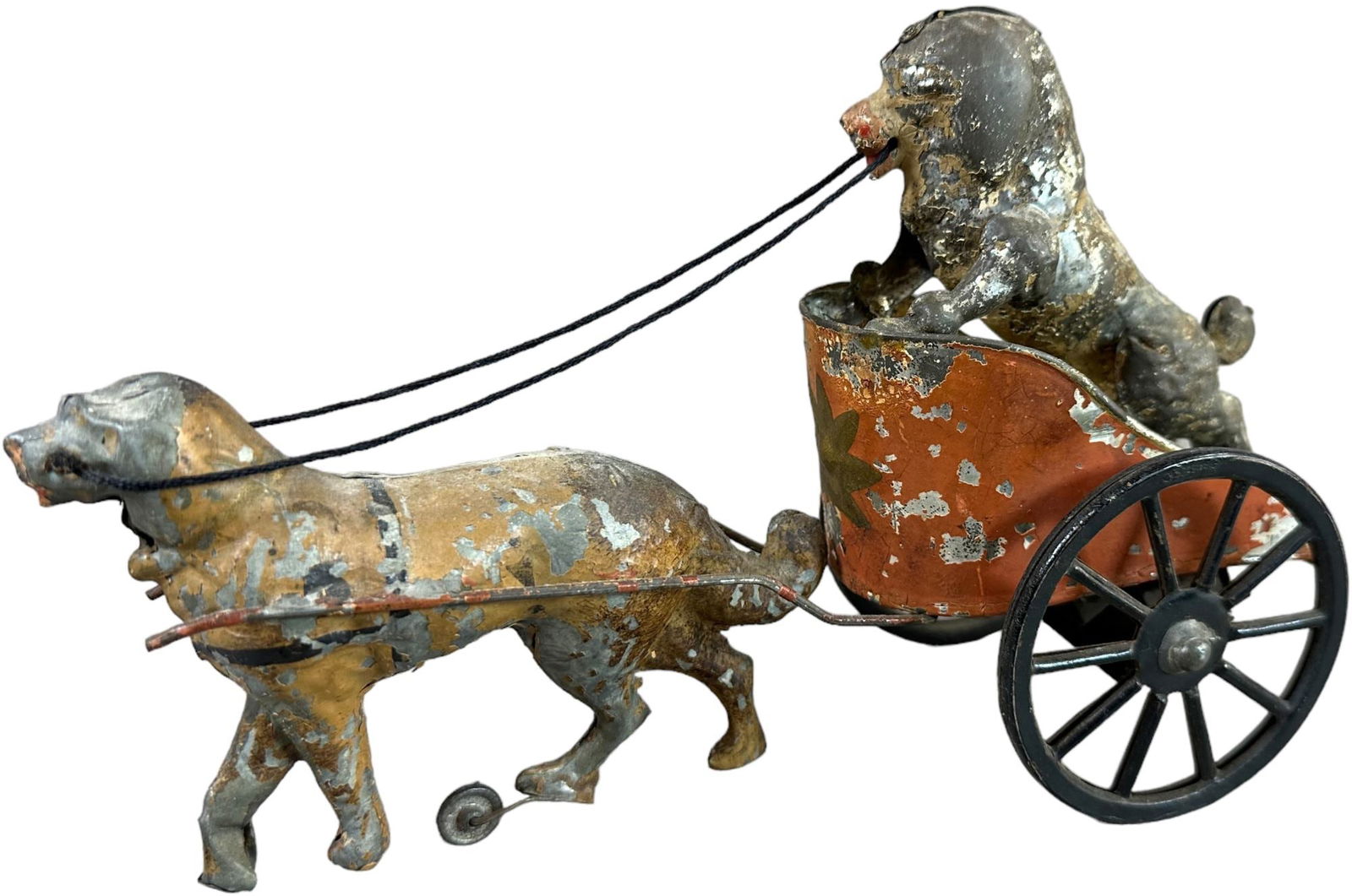 GUNTHERMANN POODLE IN CIRCUS CHARIOT: 196. GUNTHERMANN POODLE IN CIRCUS CHARIOT | Germany, wind-up. | 6.5? l. | All original with typical wear to the hand painting, (Very Good Condition) | $300 - $600