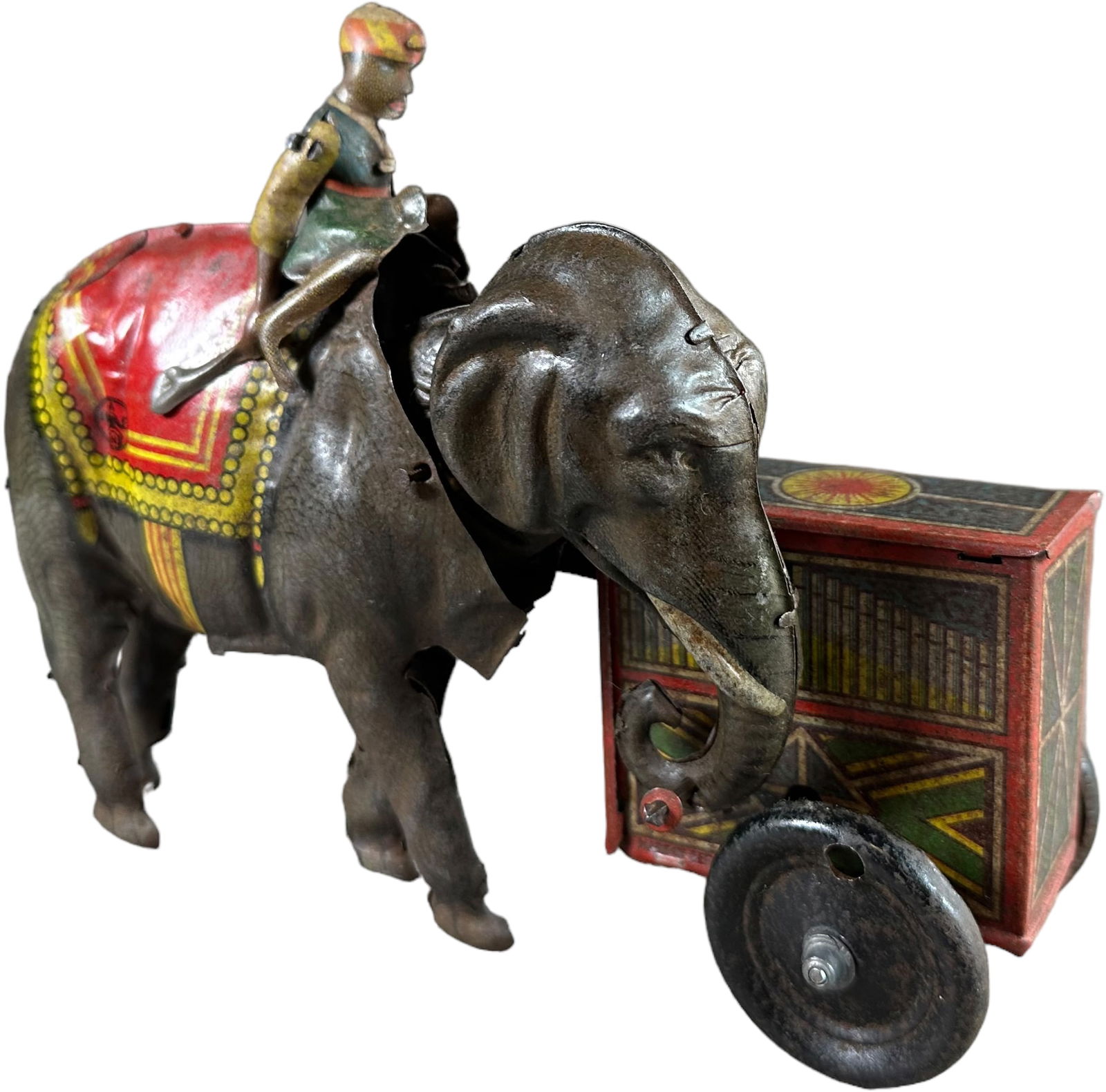 HANS EBERL ELEPHANT W/ MUSIC BOX: 200. HANS EBERL ELEPHANT W/ MUSIC BOX | Germany, wind-up, relatively scarce variation of this toy. | 8" l. | (Very Good to Excellent Condition) | $500 - $1,000