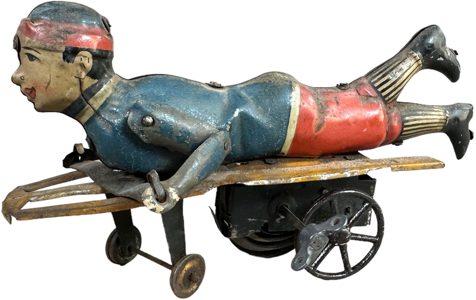 HESS BOY ON WIND-UP WHEELED SLED (1 of 4)