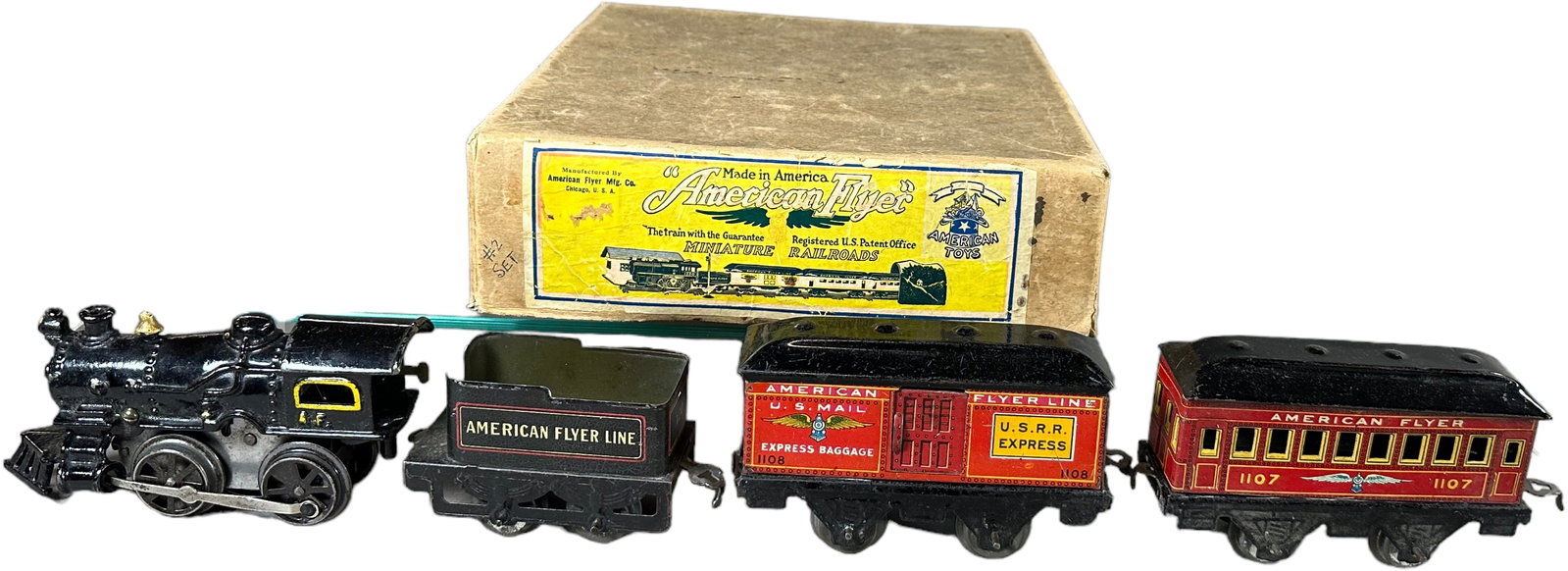 BOXED AMERICAN FLYER PASSENGER SET: 437. BOXED AMERICAN FLYER PASSENGER SET | 0 gauge, wine-up. | 5.5" l. | (Pristine Condition) | $200 - $400