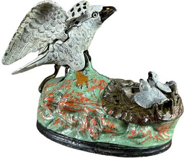 EAGLE & EAGLETS MECHANICAL BANK: 8. EAGLE & EAGLETS MECHANICAL BANK | J&E Stevens Co., extraordinary colors and highlights on base, other than some light wear at the inside of the nest from coin deposits the bank looks unused. | The