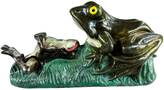 TWO FROGS MECHANICAL BANK: 86. TWO FROGS MECHANICAL BANK | J&E Stevens Co., a solid offering for this popular bank, the screw has never been turned and the small frog's leg is original and authentic to the bank, thick base pain