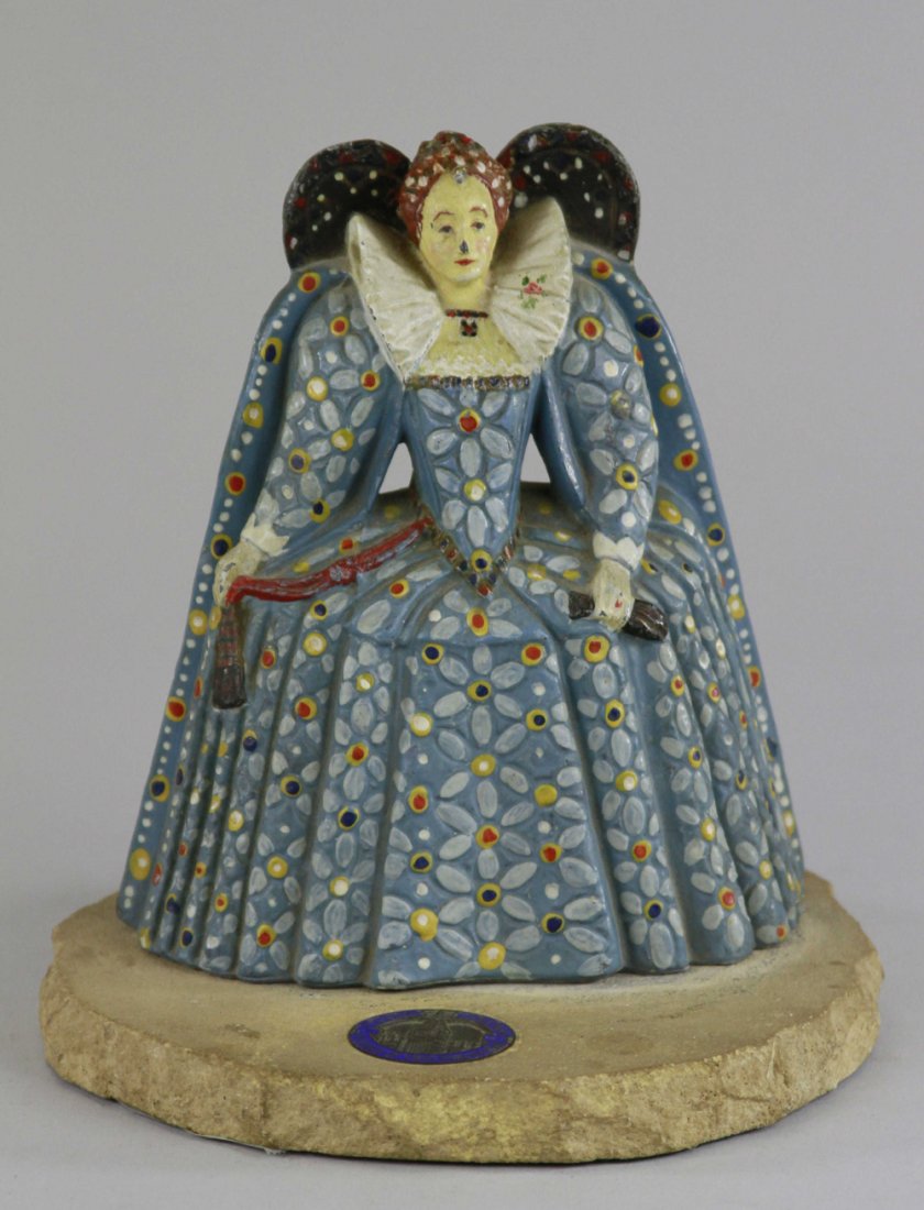 "MARY QUEEN OF SCOTS" DOORSTOP: This stone came from the House Parliament, 1941," full figure, English, cast iron, hand painted overall, on stone base w/official seal from "House of Parliament," rare. BOOK EXAMPLE. 7 1/2" x 6 1/2".